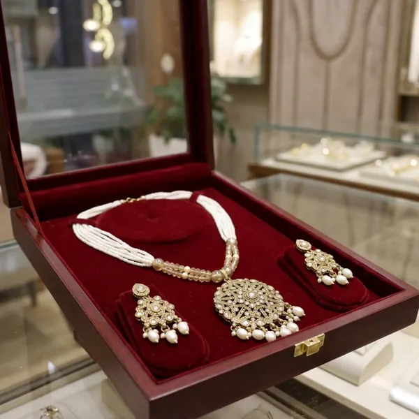 Aadhya_Kundan_&_Multi-Strand_Pearl_Necklace_With_Statement_Earrings