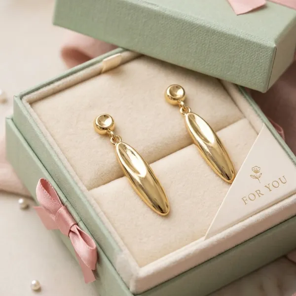Polished_Gold_Elongated_Drop_Earrings