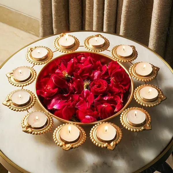Shop_the_DeepaGlow_Set_of_3_Golden_Iron_Urlis_with_32_Diyas._Decorative_urli_bowls_with_diya_holders,_perfect_for_Diwali,_pooja,_weddings,_festivals_and_home_decor.