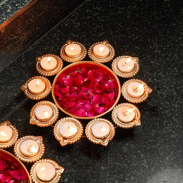 Shop_the_DeepaGlow_Set_of_3_Golden_Iron_Urlis_with_32_Diyas._Decorative_urli_bowls_with_diya_holders,_perfect_for_Diwali,_pooja,_weddings,_festivals_and_home_decor.
