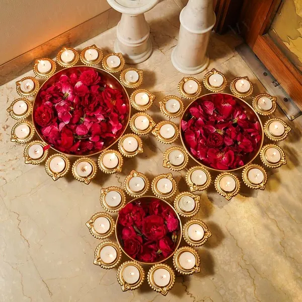 Shop_the_DeepaGlow_Set_of_3_Golden_Iron_Urlis_with_32_Diyas._Decorative_urli_bowls_with_diya_holders,_perfect_for_Diwali,_pooja,_weddings,_festivals_and_home_decor.