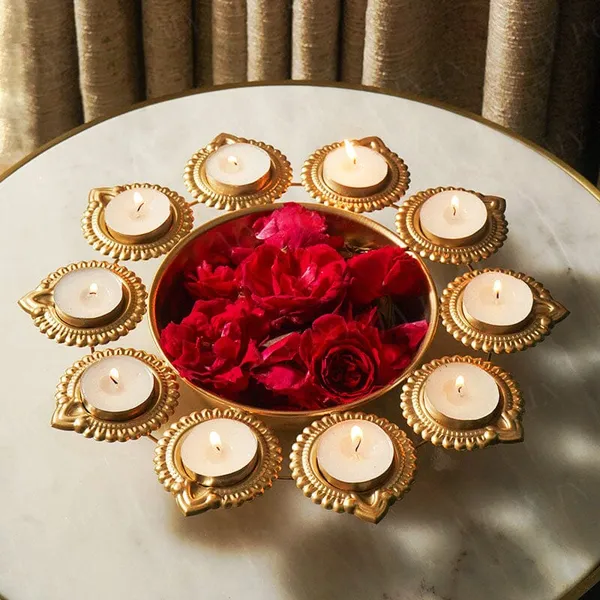 Shop_the_DeepaGlow_Set_of_3_Golden_Iron_Urlis_with_32_Diyas._Decorative_urli_bowls_with_diya_holders,_perfect_for_Diwali,_pooja,_weddings,_festivals_and_home_decor.