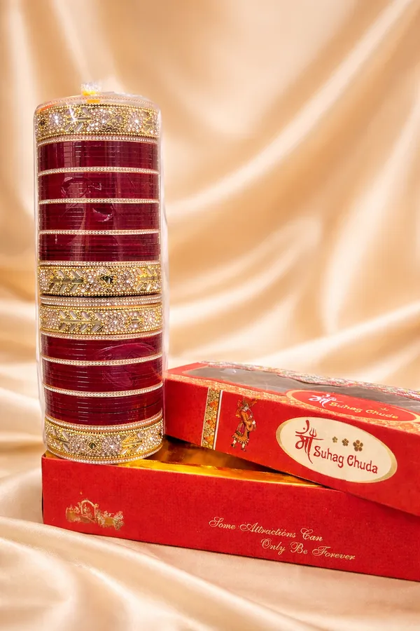 Red_And_Gold_Plastic_Embellished_Punjabi_Bridal_Chura_Set_For_Women