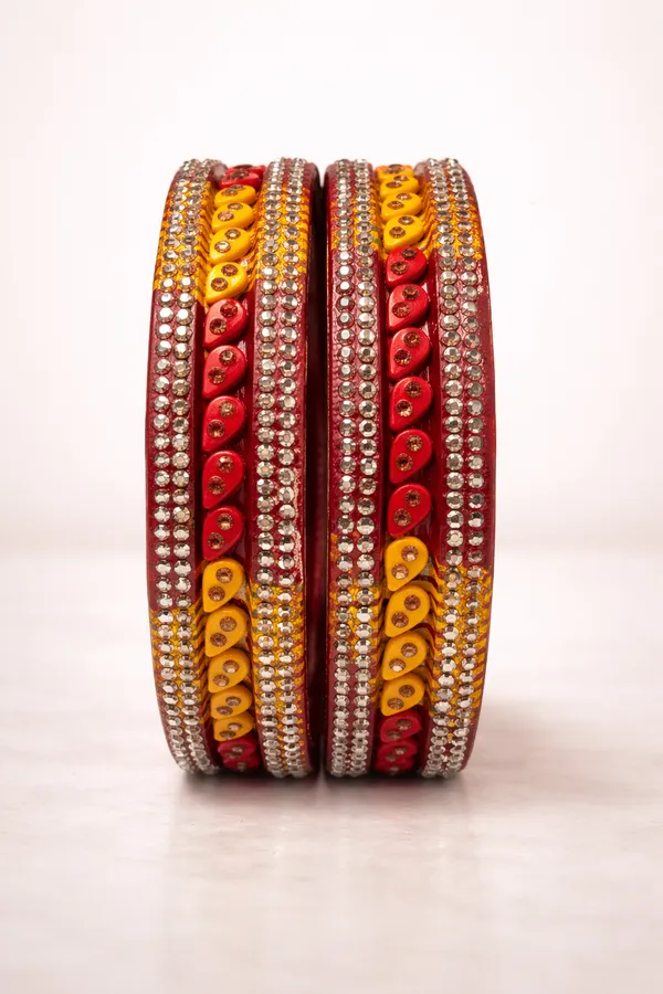 Red_And_Yellow_Lac_Crystal_Studded_Paisley_Bangle_Set_For_Women