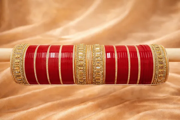 Red_Plastic_Gold_Embellished_Bridal_Chura_Bangles_Set_For_Women