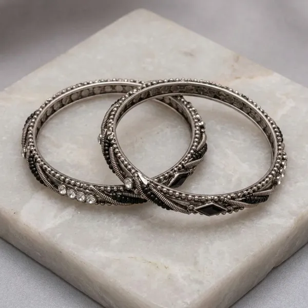 Black_And_Silver_Oxidized_Metal_Crystal_Embellished_Bangles_For_Women_-_Pack_Of_2