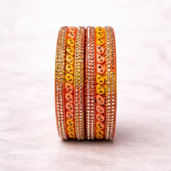 Orange_And_Yellow_Lac_Silk_Thread_Stone_Embellished_Bangle_Set_For_Women
