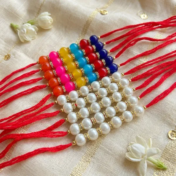 Dhivara_Pearl_Rakhi_Combo_/_Pack_Of_10_Rakhi_With_Roli_Chawal