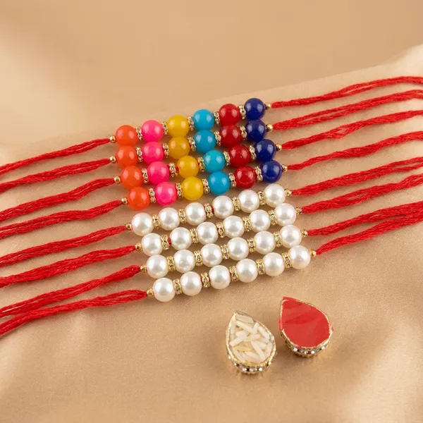Dhivara_Pearl_Rakhi_Combo_/_Pack_Of_8_Rakhi_With_Roli_Chawal
