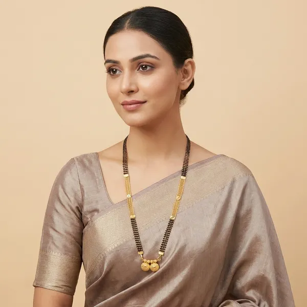 Golden_Multi-Strand_Mangalsutra_with_Black_Beads_and_Pendant
