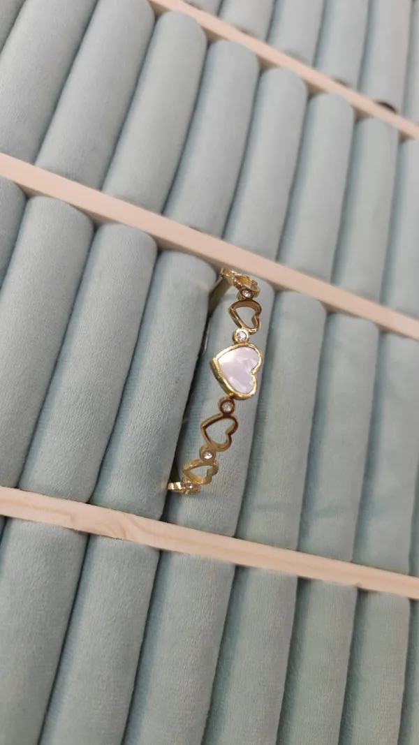 Gold_Tone_Heart_Design_Bracelet_with_Pink_Stone_Accent
