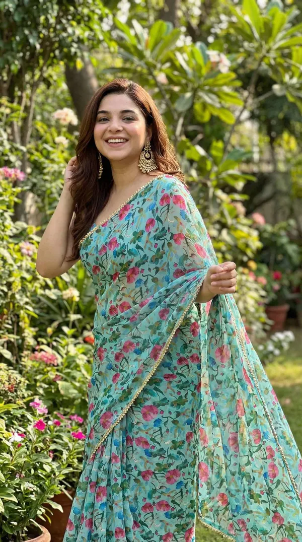 Sage_Green_Floral_Georgette_Saree_With_Heavy_Border_&_Blouse_Piece