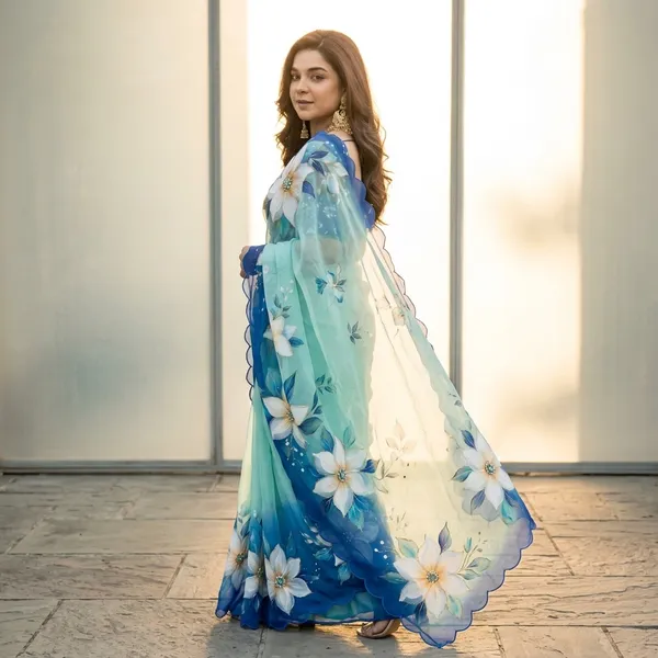 Aqua_Blue_Floral_Georgette_Saree_With_Delicate_Hand_Work_&_Blouse_Piece