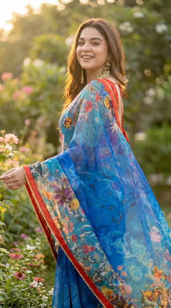 Royal_Blue_And_Orange_Floral_Georgette_Saree_With_Golden_Border_&_Blouse_Piece