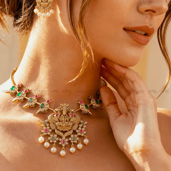 Gold_Lakshmi_Temple_Necklace_Set_With_Emerald_And_Ruby_Accents