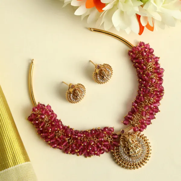 Gold_Plated_Lakshmi_Motif_Stud_Earrings_With_Crystals