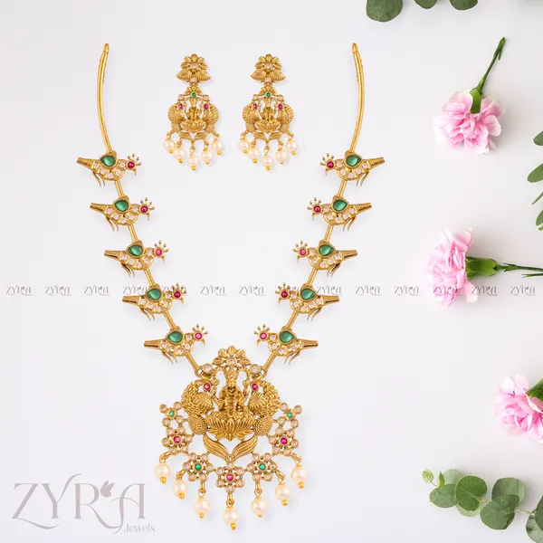 Gold_Lakshmi_Temple_Necklace_Set_With_Emerald_And_Ruby_Accents