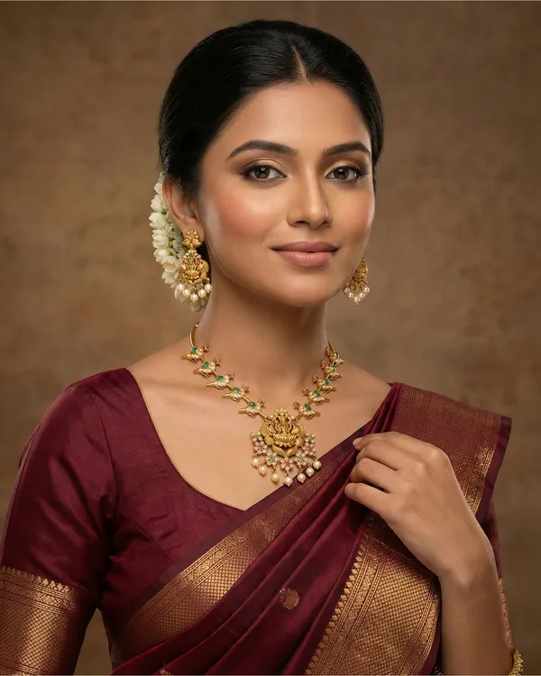 Gold_Lakshmi_Temple_Necklace_Set_With_Emerald_And_Ruby_Accents
