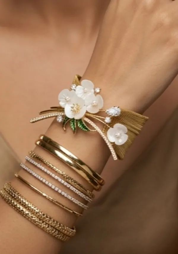 Gold_Floral_Bracelet_With_White_Stones_And_Green_Leaves