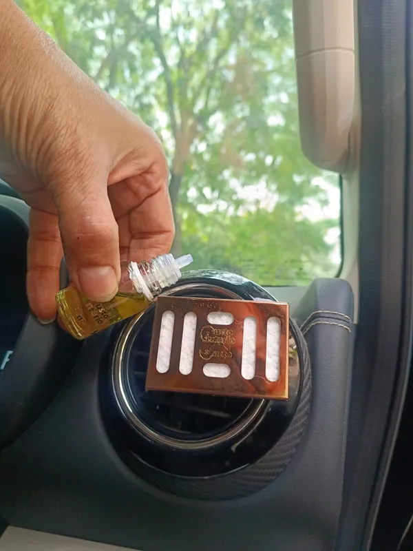 Silver_Dispenser_With_Sandal_Aroma_Oil_Car_Freshner_Combo
