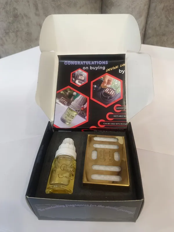 Silver_Dispenser_With_Sandal_Aroma_Oil_Car_Freshner_Combo