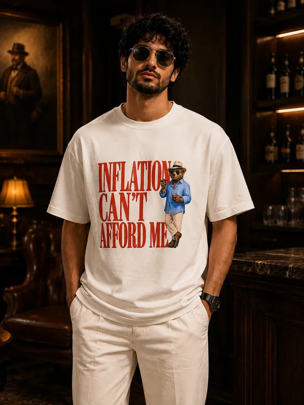 QUROS_Inflation_Can’t_Afford_Me_CREAME_Oversized_T-Shirt