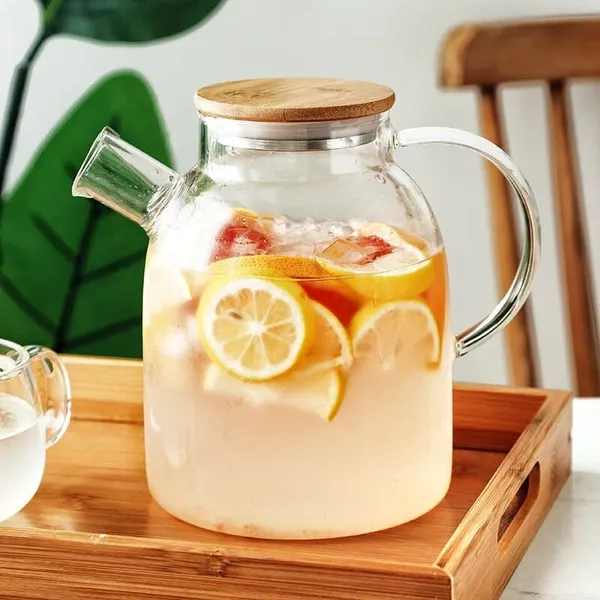Pack_Of_2_Premium_270ml_Borosilicate_Glass_Water_Jug_With_Stainless_Steel_Lid_Handle_Transparent_Beverage_Carafe_For_Home_Office_For_Serve_Water_Juice_Jug_1_8_Lieter_Wooden_Lid