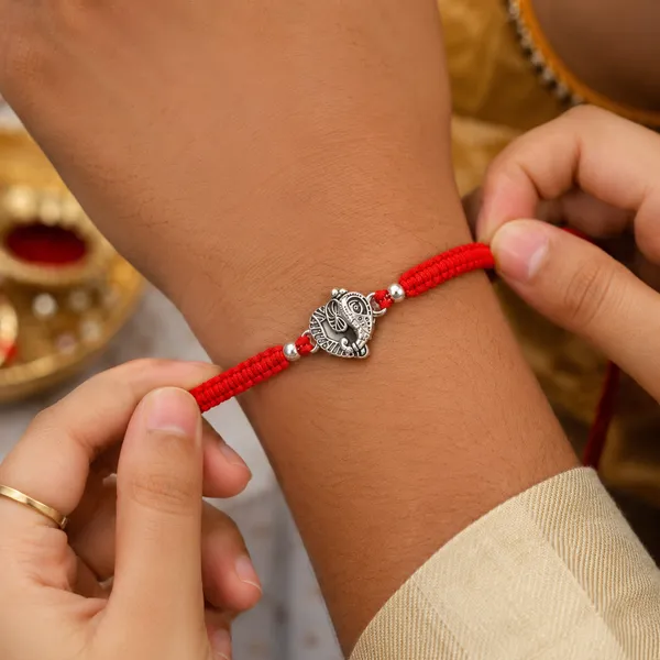 Temple_Tales_Ganesh_Mangal_Silver_Rudraksha_Rakhi_for_Raksha_Bandhan