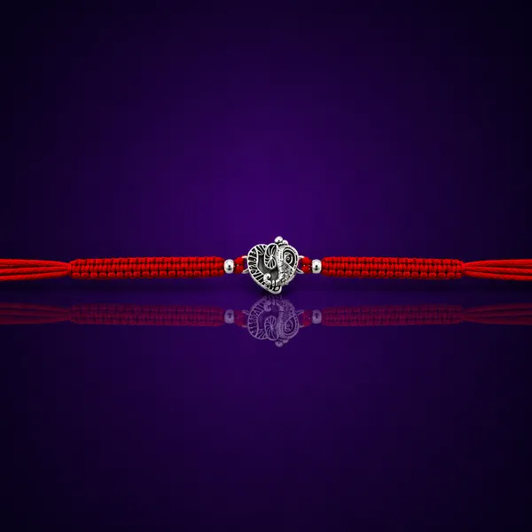 Temple_Tales_Ganesh_Mangal_Silver_Rudraksha_Rakhi_for_Raksha_Bandhan