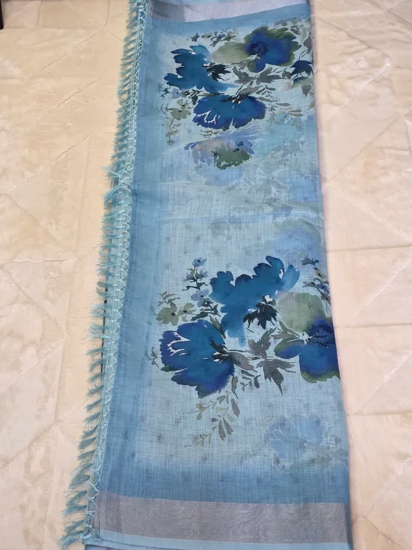 Sky_Blue_Pure_Linen_Floral_Print_Fringed_Saree_For_Women