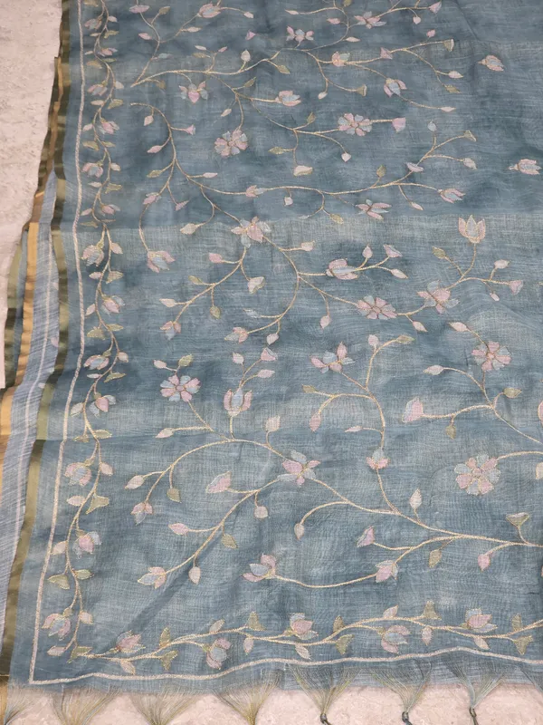 Pastel_Blue_Linen_Tissue_Floral_Embroidered_Golden_Border_Saree_For_Women