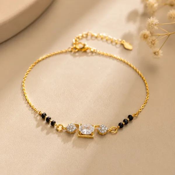 Mangalsutra_Bracelet_With_Oval_Stone_And_Flowers