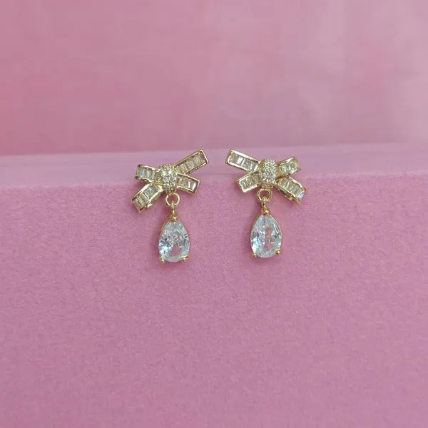 Gold_Alloy_American_Diamond_Bow_Stud_Earrings_For_Women