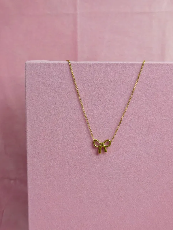 Gold_Alloy_Bow_Pendant_Necklace_For_Women