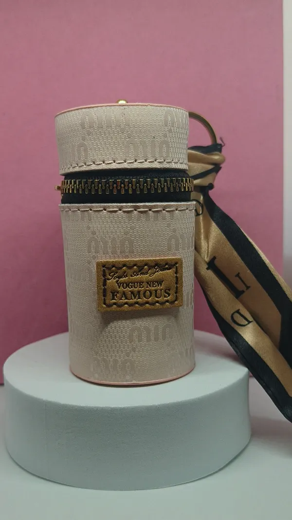 Beige_Textured_Cylindrical_Crossbody_Bag_with_Zipper
