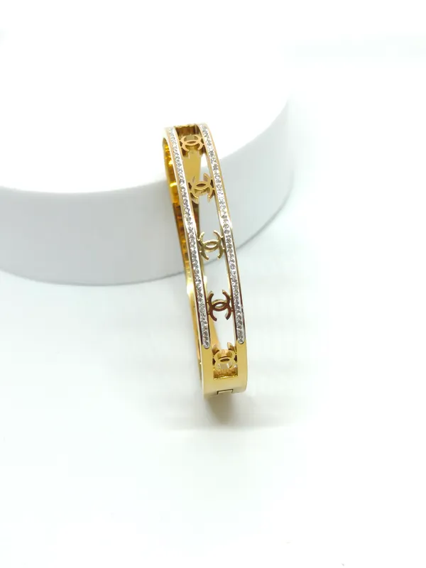 Gold_Tone_Crystal_Embellished_Screw_Detail_Bangle_Bracelet