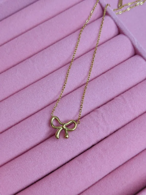 Gold_Alloy_Bow_Pendant_Necklace_For_Women