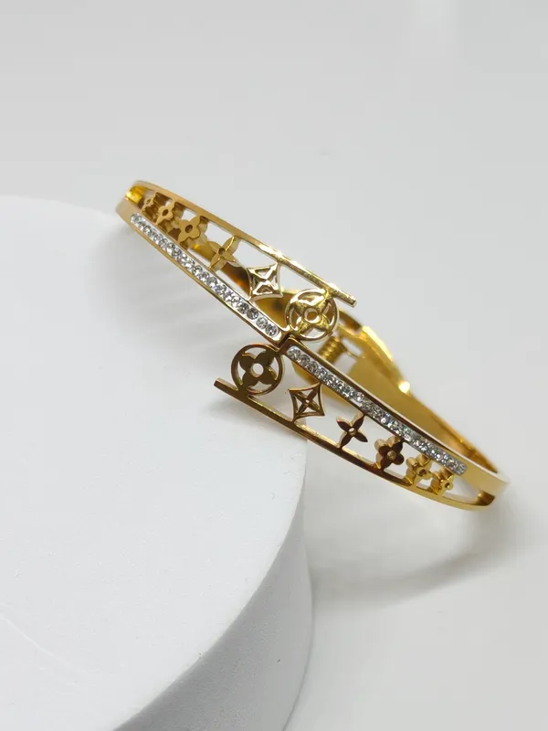Gold_Plated_Dual_Band_Bracelet_with_Star_and_Moon_Design