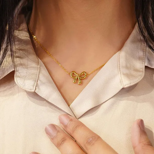 Gold_Alloy_Bow_Pendant_Infinity_Chain_Necklace_Set_For_Women