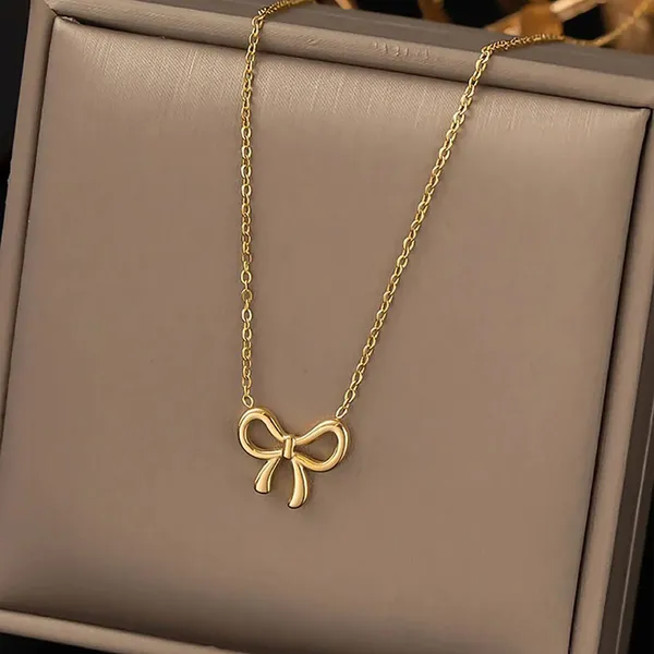 Gold_Alloy_Bow_Pendant_Infinity_Chain_Necklace_Set_For_Women