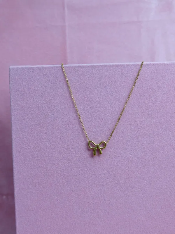 Gold_Alloy_Bow_Pendant_Necklace_For_Women
