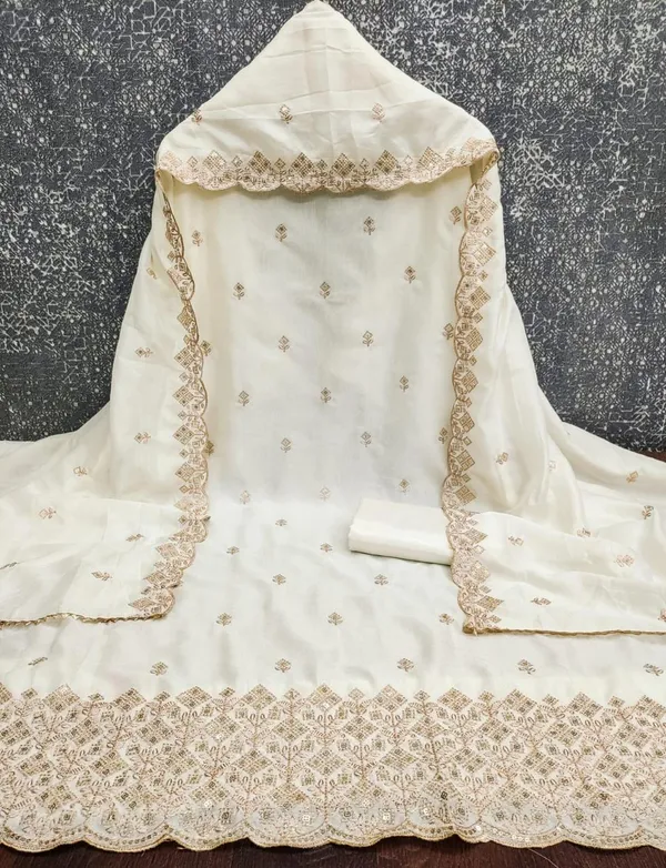 Off_White_Vichitra_Silk_Dress_Material_With_Exquisite_Sequins_And_Zari_Embroidery