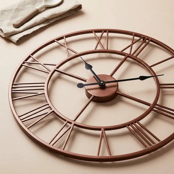 Vintage_Roman_Metal_Wall_Clock_–_Open_Frame_Design