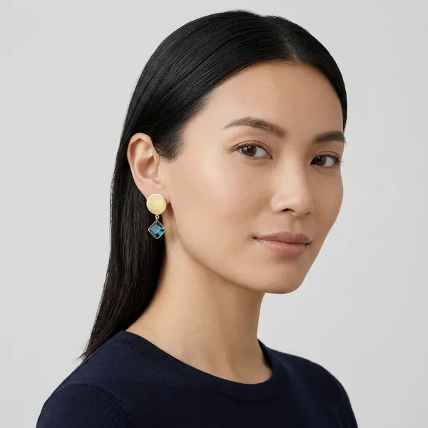 Gold_Brushed_Disc_Earrings_with_Blue_Crystal_Drop