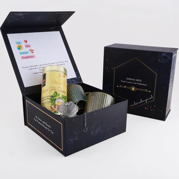 Tattva_Adih_Ginger_Tulsi_Turmeric_Green_Tea_Gift_Hamper_|_Premium_Gift_Box_With_100G_Ginger_Tulsi_Turmeric_Green_Tea,_Stainless_Steel_Infuser_&_2_Ceramic_Cups_|_Luxury_Wellness_Gift_Set_For_Festive,_Corporate_&_Personal_Gifting