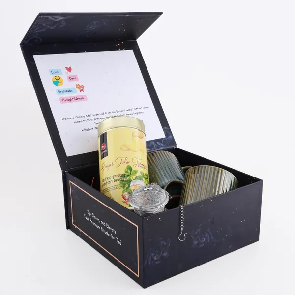 Tattva_Adih_Ginger_Tulsi_Turmeric_Green_Tea_Gift_Hamper_|_Premium_Gift_Box_With_100G_Ginger_Tulsi_Turmeric_Green_Tea,_Stainless_Steel_Infuser_&_2_Ceramic_Cups_|_Luxury_Wellness_Gift_Set_For_Festive,_Corporate_&_Personal_Gifting