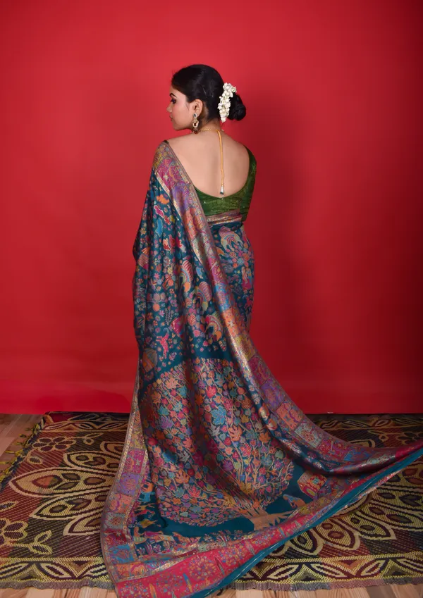 Rajwada_Durbar:_Jewel-toned_Emerald_Mulberry_silk_with_royal_Darbar_motifs_and_Chinar_trees