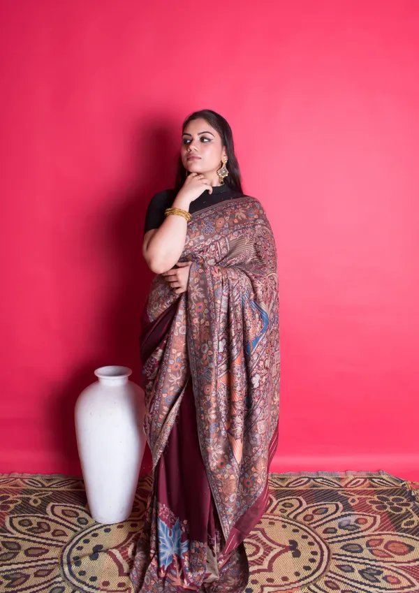 Rani_Rogue:_Earthy_mulberry_silk_saree_with_vibrant_maple_chinar_weave_motifs