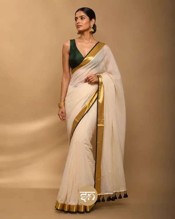 Anuragini:_Off-White_Saree_with_Broad_Golden_and_Subtle_Bottle_Green_Border_for_Women