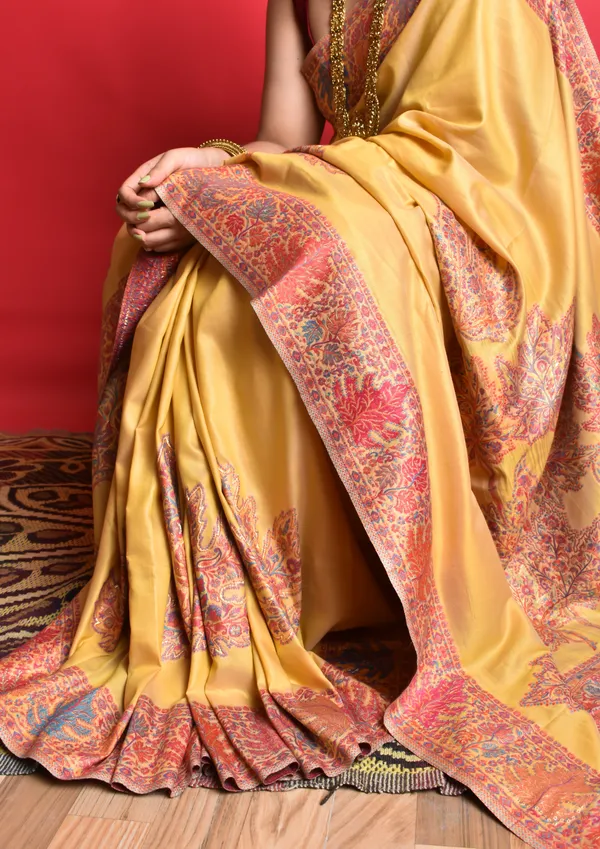 The_Autumn_Gold:_Golden_yellow_Mulberry_silk_saree_with_vibrant_autumn_Chinar_leaves